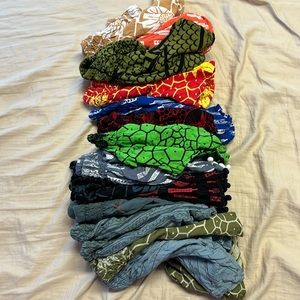 14 pairs of kids Living Hula shorts. Kids size large, fits more like a kids S-M